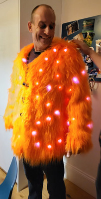 Orange illuminated fluffy coat